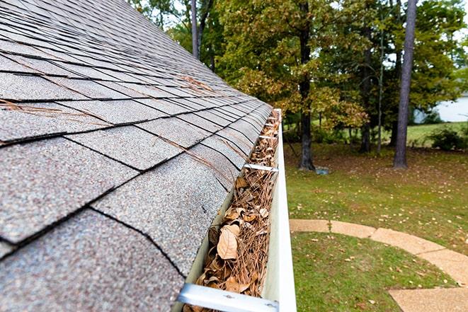 roof gutter cleaning services in action